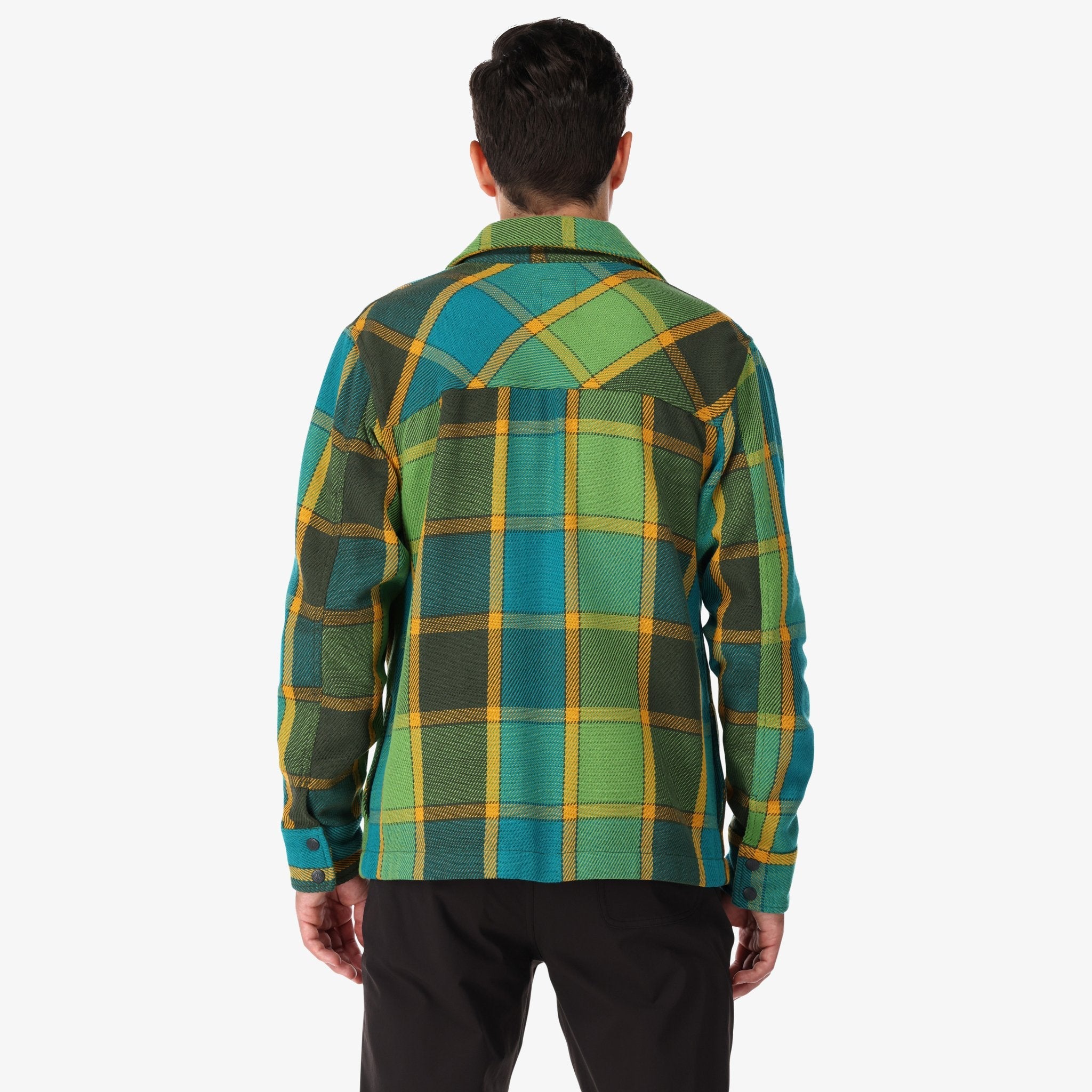 Back of Topo Designs Men's Mountain Shirt Jacket in Olive green gold plaid on model.