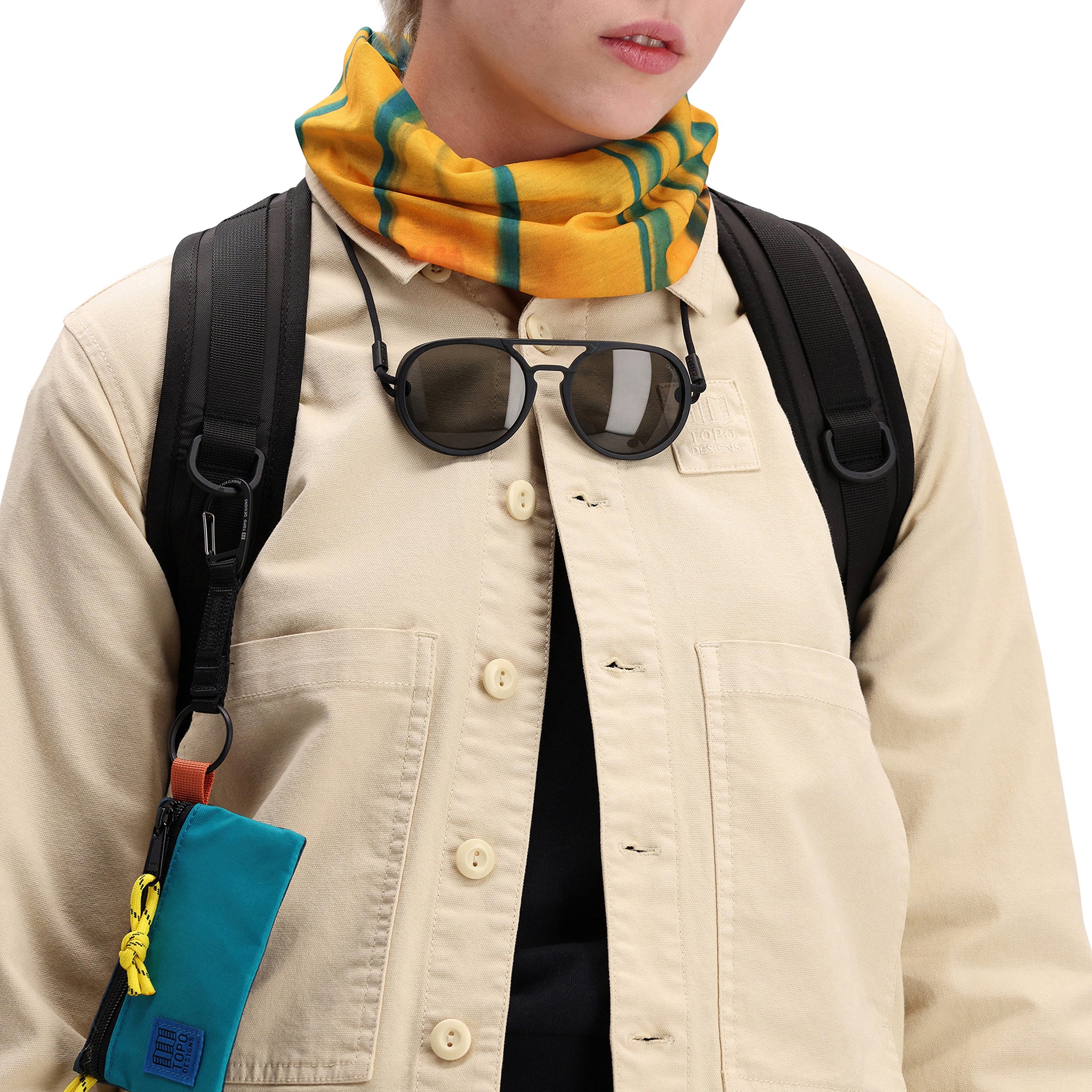 Front model shot of Topo Designs Women's Dirt Jacket 100% organic cotton shirt jacket in "sand" brown white