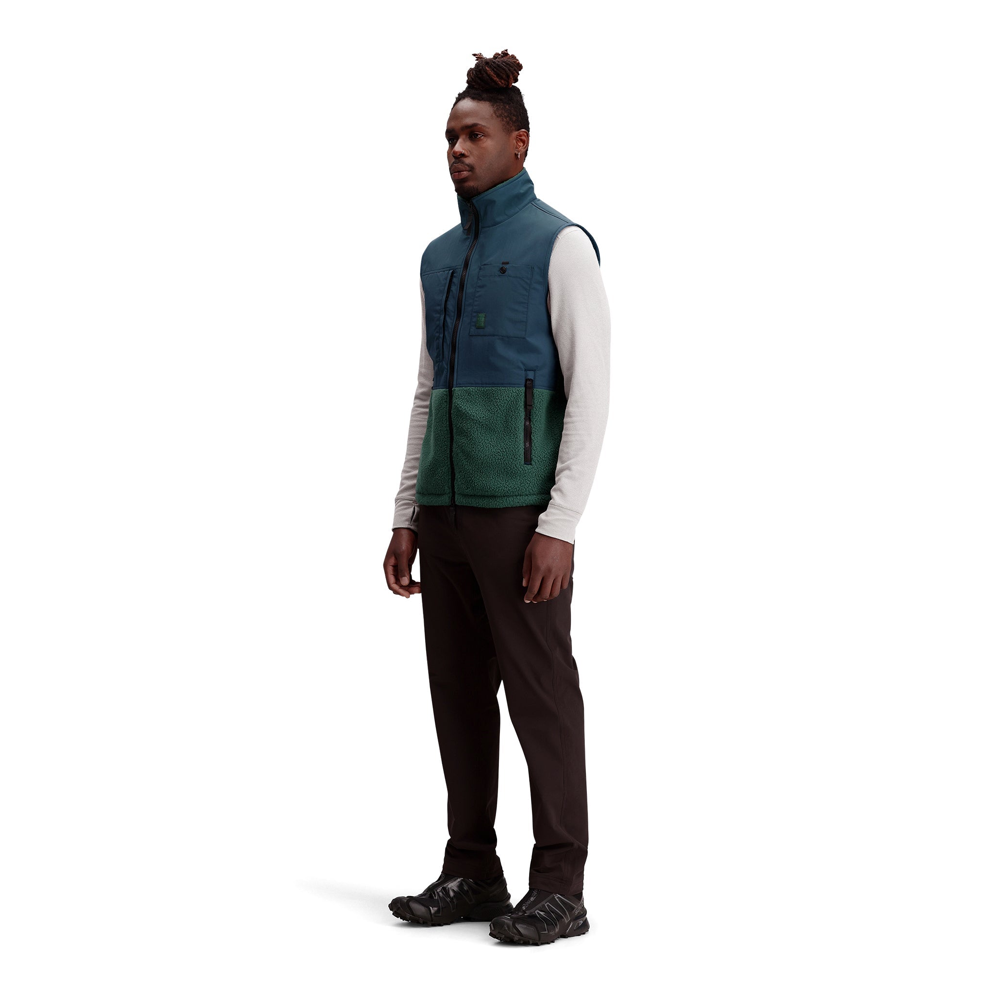 General shot of Subalpine fleece vest in "Forest / Pond Blue"