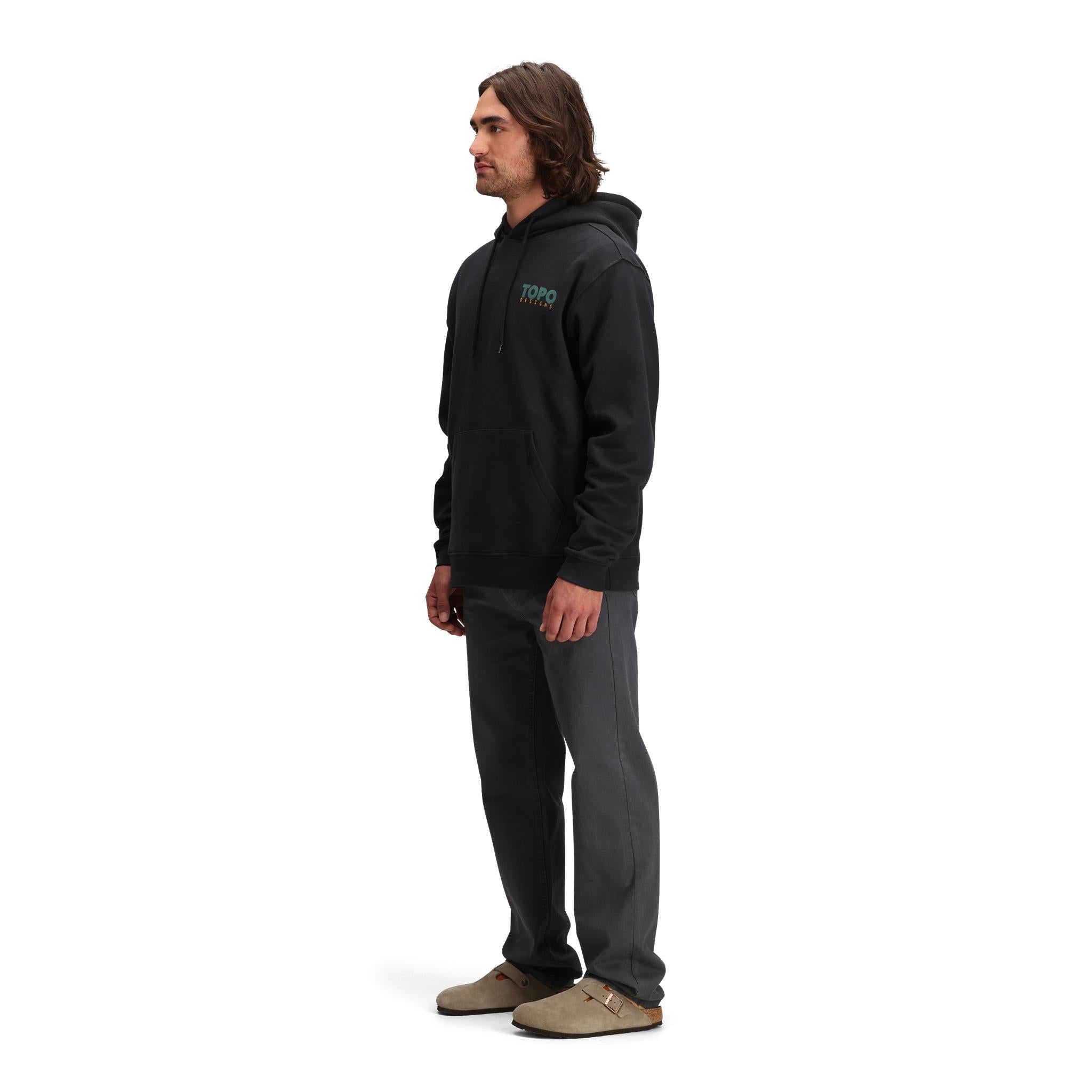 General side model shot of Topo Designs Alpine High Hoodie - Pinnacle in "Black"