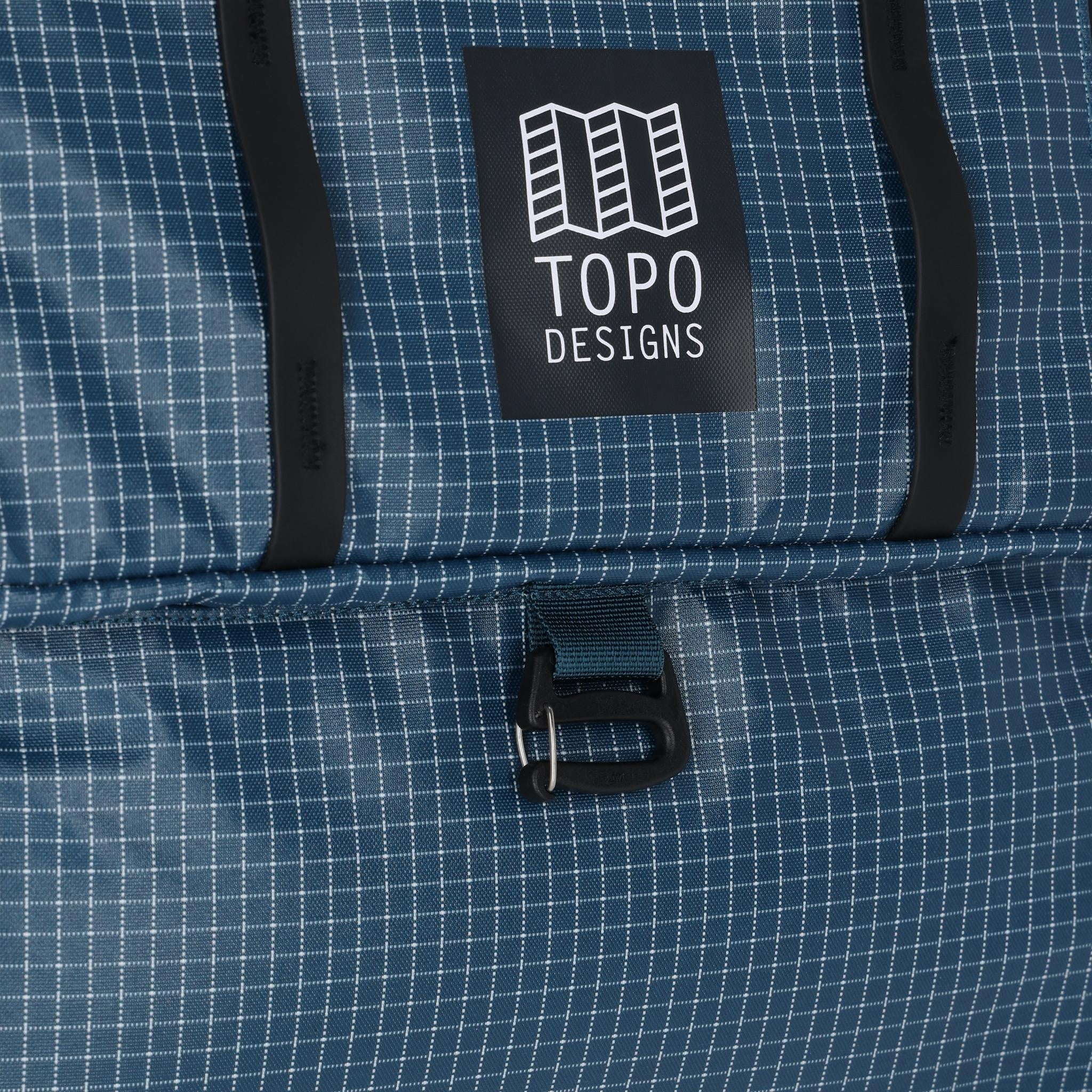 Detail shot of Topo Designs Apex Travel Roller Bag in "Pond Blue"