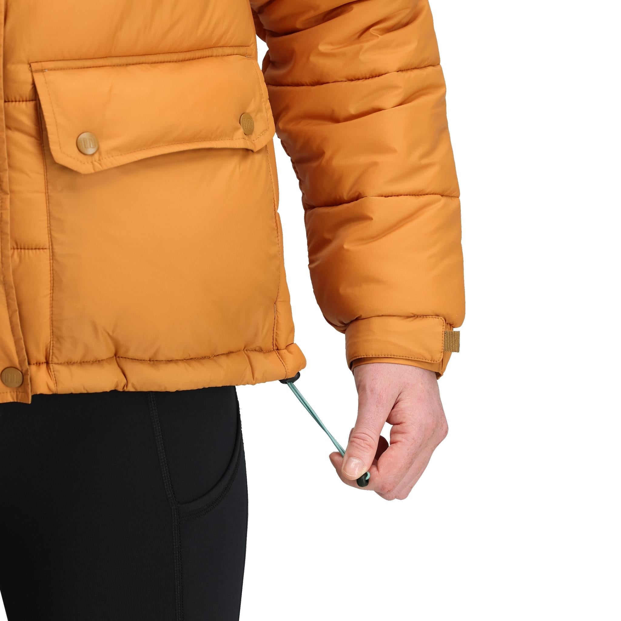 Detail shot of Topo Designs Retro Ridge Puffer Jacket - Women's  in "Dark Khaki / Spice"