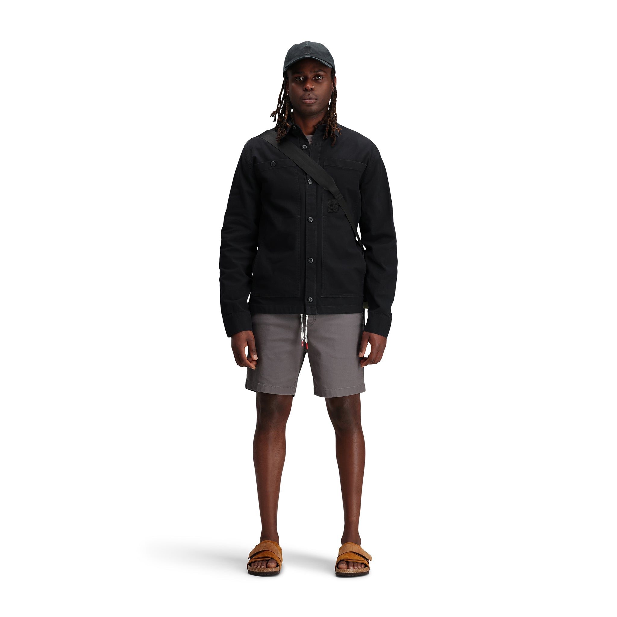 Model shot of Topo Designs Men's Dirt shirt Jacket 100% organic cotton in "Black".