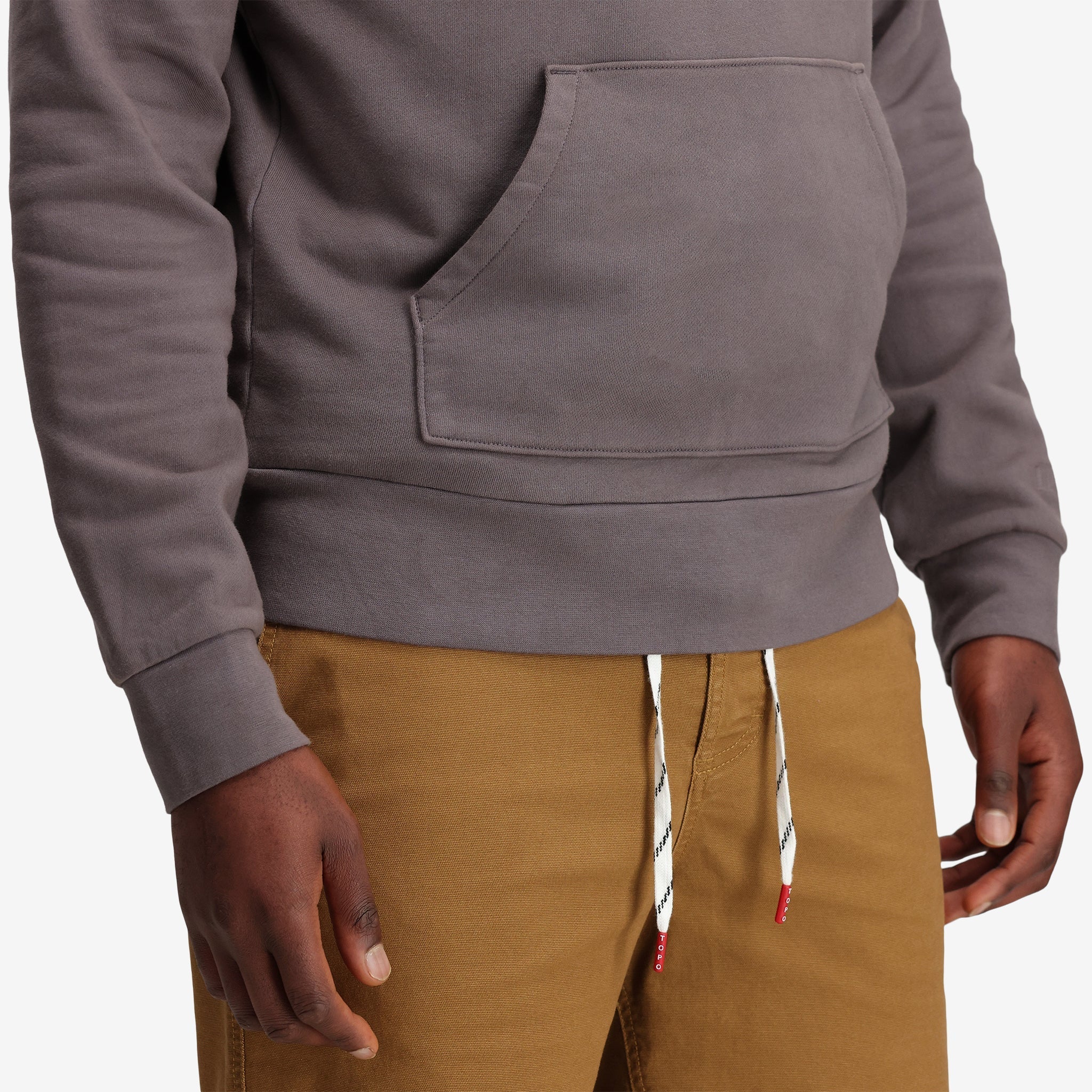 General detail shot of Topo Designs Men's Dirt Hoodie 100% organic cotton French terry sweatshirt in "charcoal" gray.