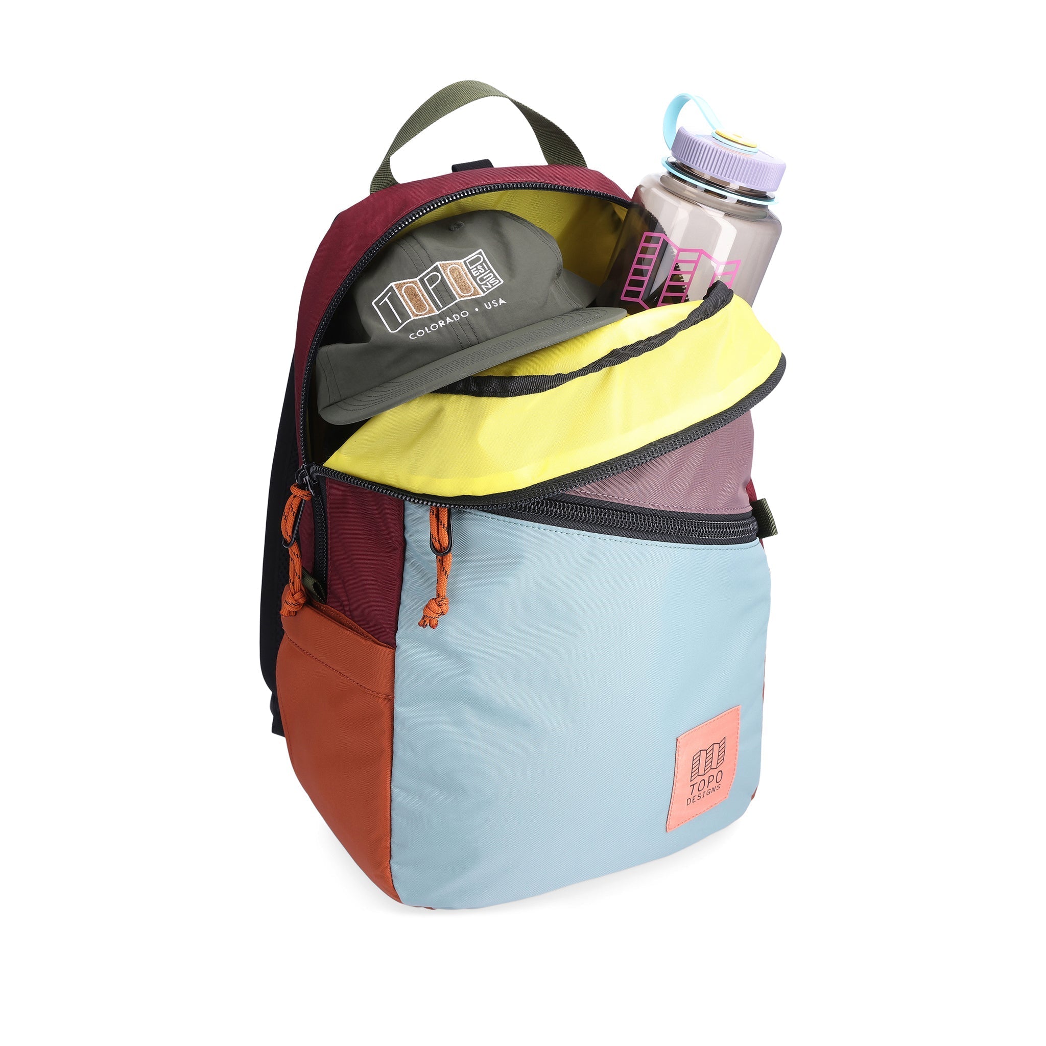 Open main compartment view of Topo Designs Light Pack in recycled "Mineral Blue / Peppercorn" nylon.