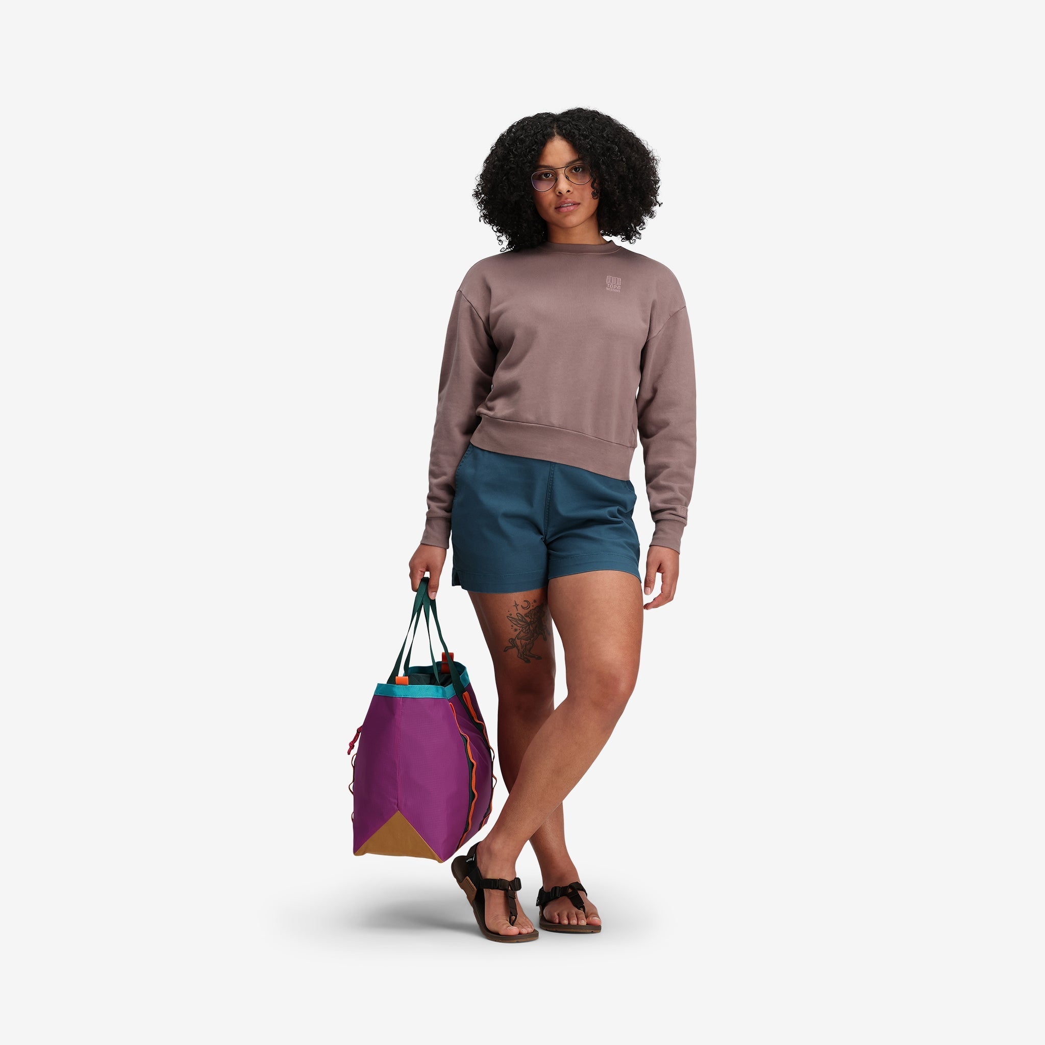 Model shot of Topo Designs Women's drawstring Dirt Shorts in 100% organic cotton "Pond Blue".