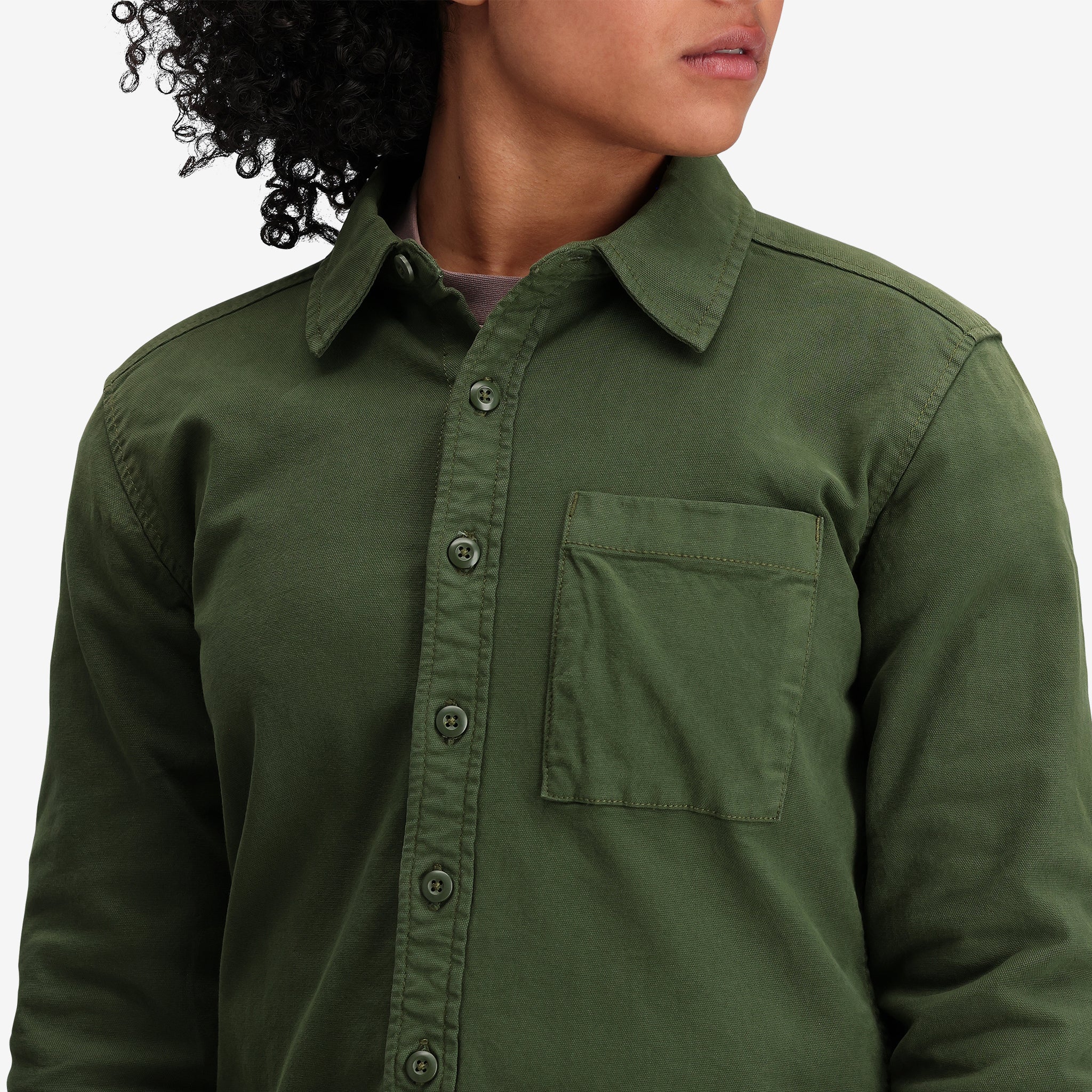 Detail shot of Topo Designs Women's Dirt Shirt in "Olive" Green.