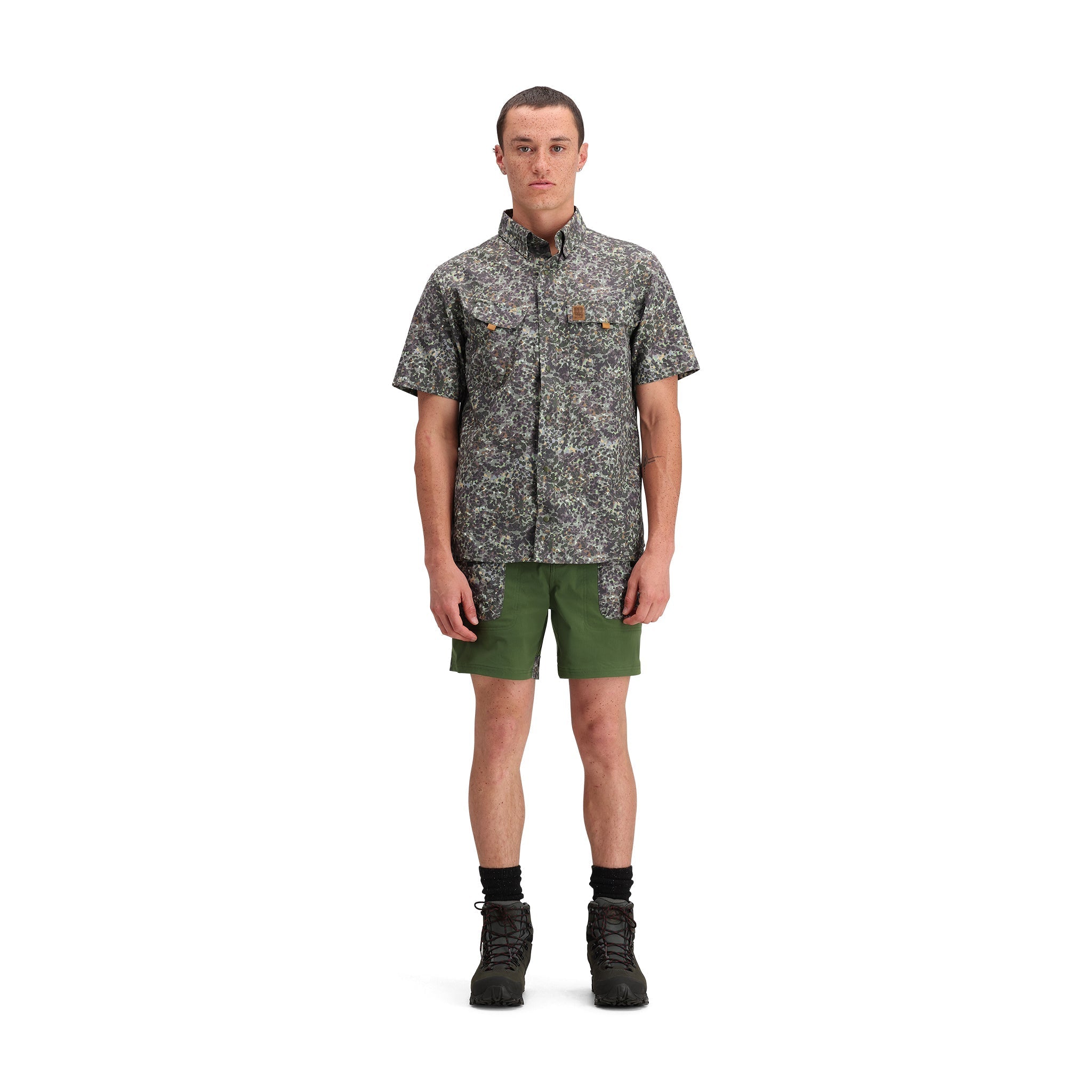 General front model shot of Topo Designs Retro River Shirt Ss - Men's in "Olive Meteor"