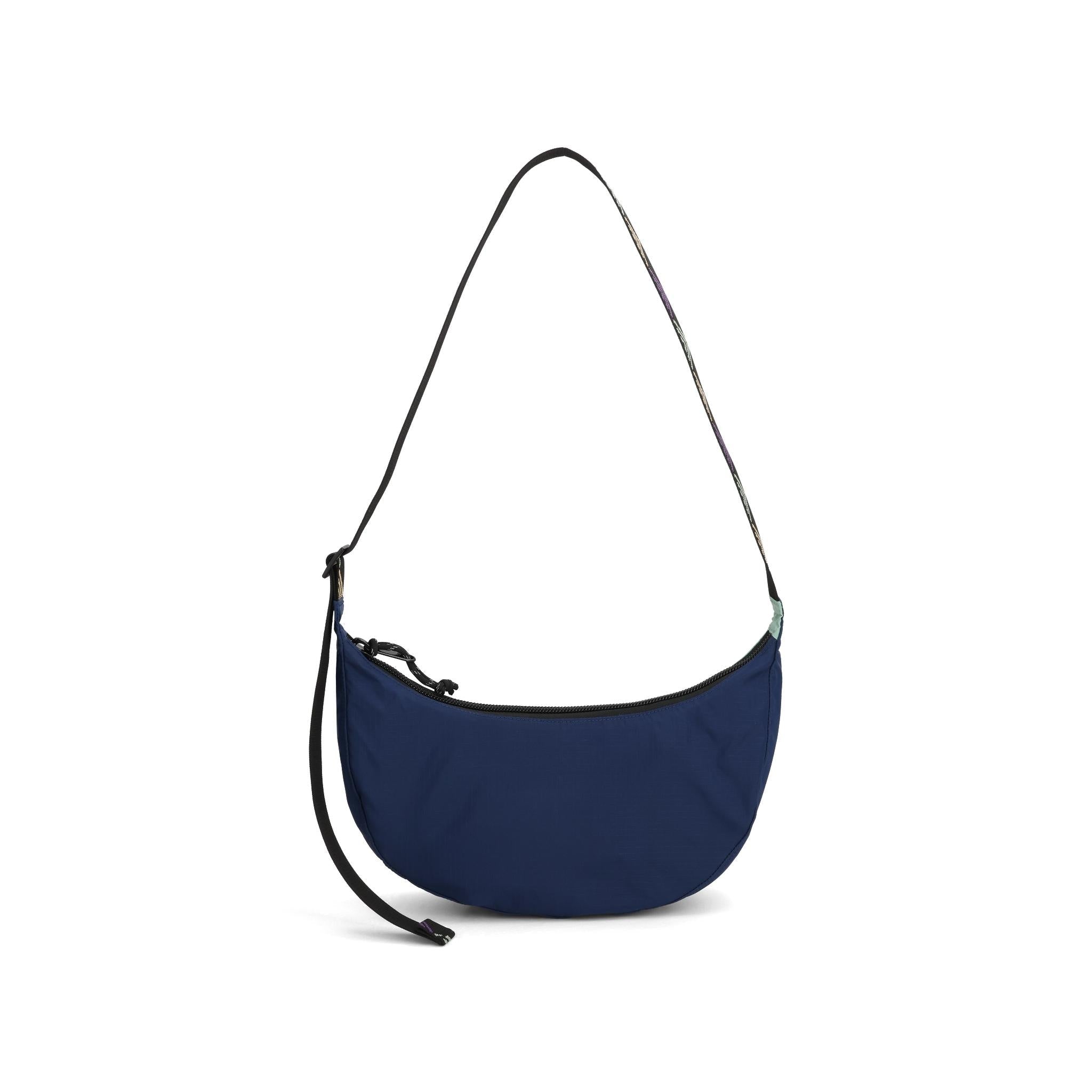 Back View of Topo Designs Moonlight Crossbody Bag in "Midnight / Loganberry"