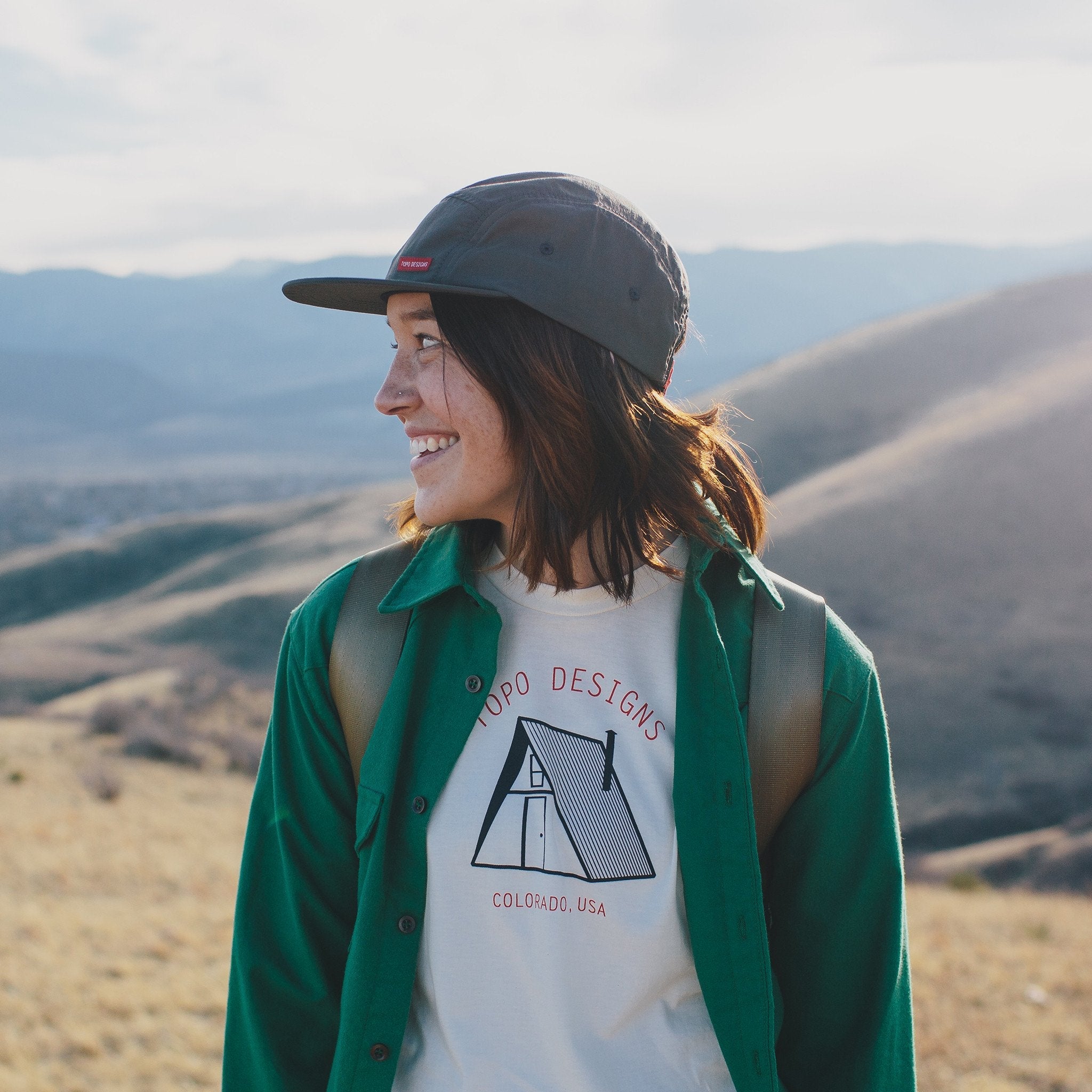 Lifestyle shot of the Nylon Camp Hat in navy