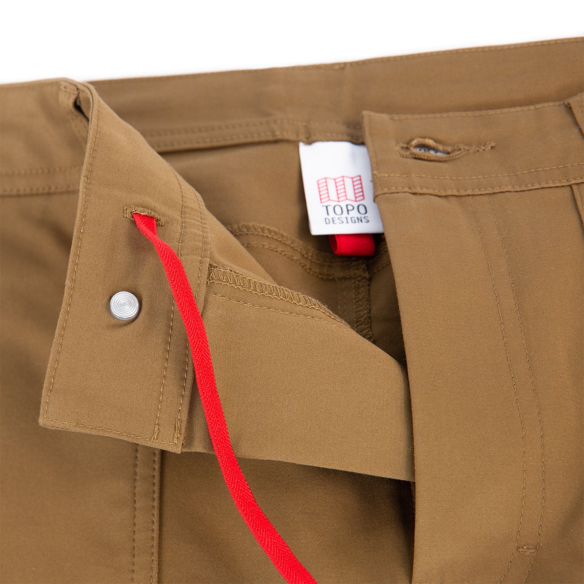 Topo Designs Men's Global Pants lightweight cotton nylon travel pants in Dark Khaki brown showing red internal drawstring