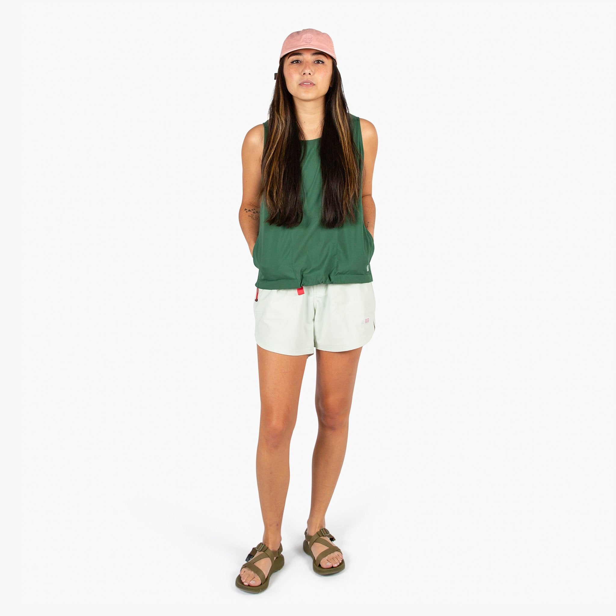 General shot of Topo Designs Women's River quick-dry swim Shorts in light mint on model.