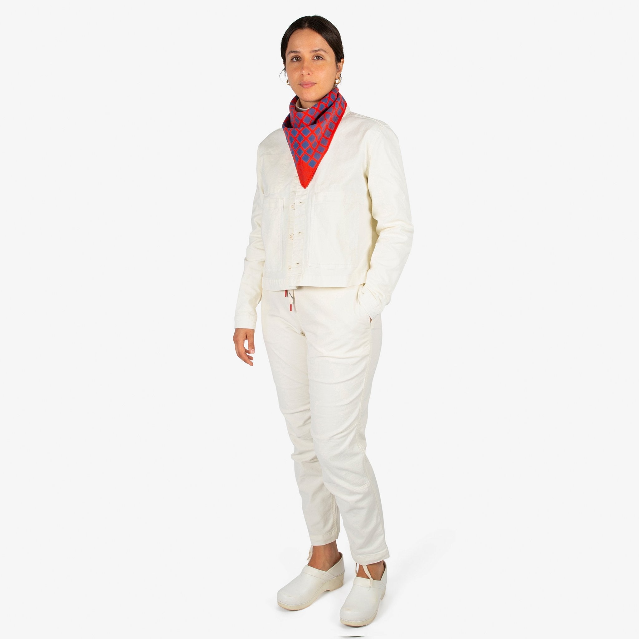 Front model shot of Topo Designs Women's Dirt Jacket & Pants in Natural white.