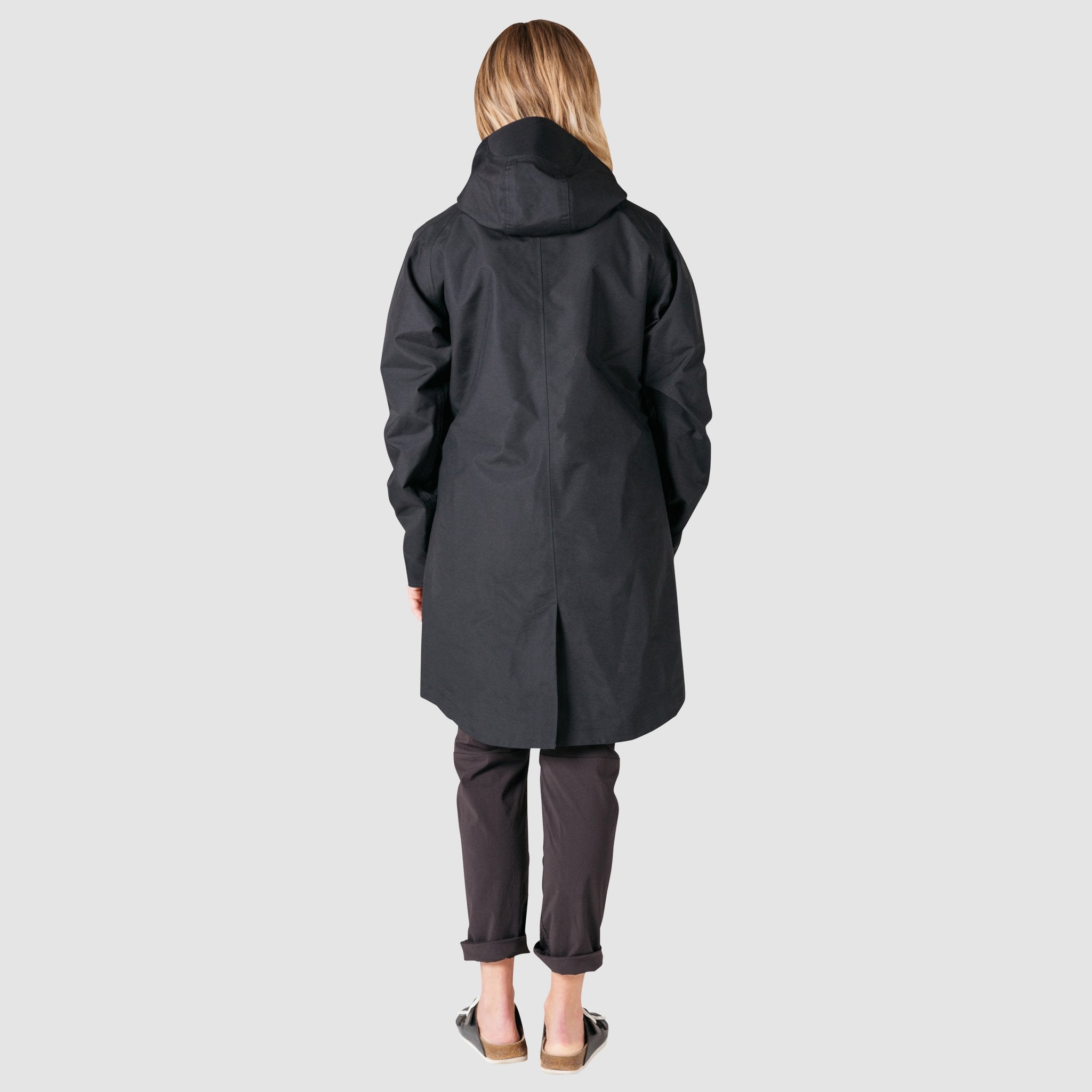 Back full body model shot of women's tech trench 3L in black