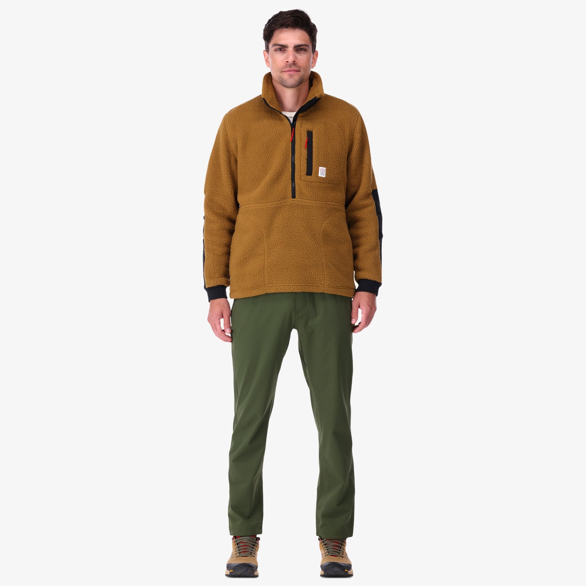 Topo Designs Men's Mountain Fleece Pullover in "dark khaki / black" brown on model.