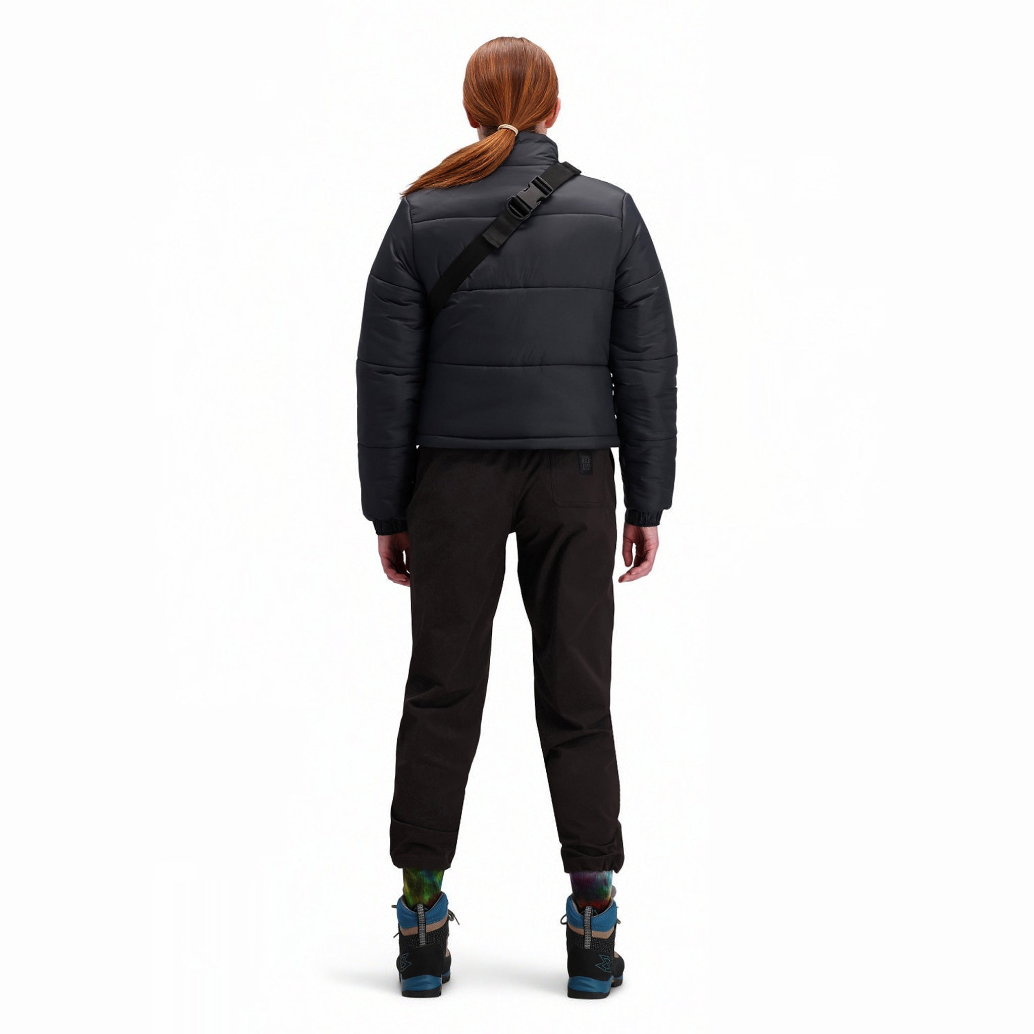 Back model shot of Topo Designs women's boulder lightweight hiking and climbing pants in "black"